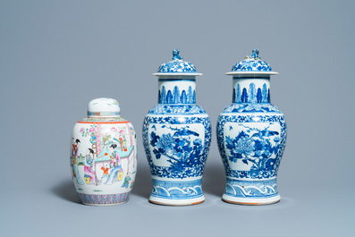 A pair of Chinese blue and white vases and a famille rose jar and cover, 19/20th C.