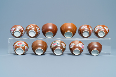 31 Chinese capucine brown-ground saucers and 22 cups, Kangxi/Qianlong