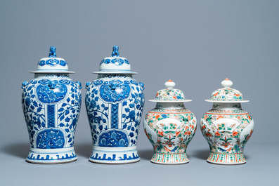 Two pairs of Chinese blue and white and famille verte vases and covers, 19/20th C.