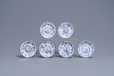 Six Chinese blue, white and copper-red cups and saucers, Kangxi