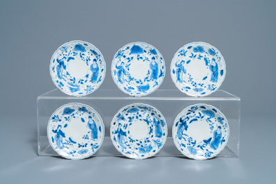 A collection of Chinese and Japanese blue and white cups and saucers and two ewers, Wanli and later