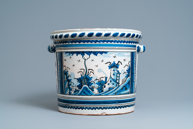 A large blue, white and manganese 'landscape' jardini&egrave;re, Nevers, France, 18th C.