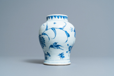 A Chinese blue and white vase with birds among blossoms, Transitional period