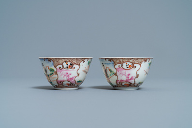 A pair of fine Chinese famille rose 'Mandarin' cups and saucers, Qianlong