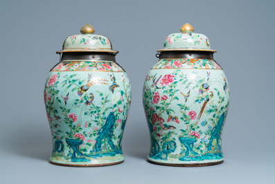A pair of large Chinese Canton famille rose celadon-ground vases and covers, 19th C.