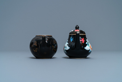 Two Chinese famille noire teapots, a pattipan and two spoon trays, Yongzheng/Qianlong