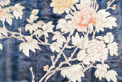 Three Chinese panels of embroidered silk, 19/20th C.