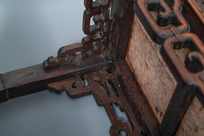 Two Chinese hongmu wooden stands with marble tops, 19th C.