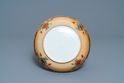 A Chinese capucine brown-ground famille verte plate and a bowl, Kangxi