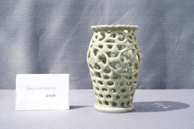 A Chinese reticulated monochrome Longquan celadon brush pot, Ming