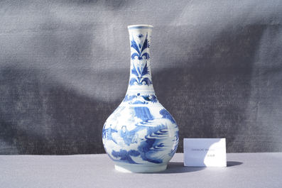 A Chinese blue and white bottle vase with figures in a landscape, Transitional period