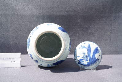 A Chinese blue and white jar and cover with figures in a landscape, Transitional period