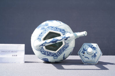 A large Chinese blue and white 'qilin' wine ewer and cover, Transitional period