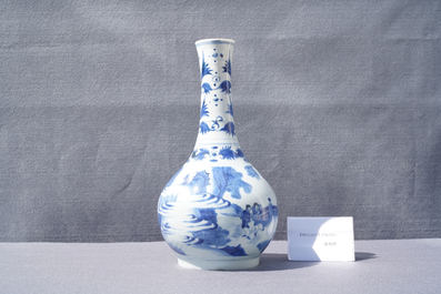 A Chinese blue and white bottle vase with figures in a landscape, Transitional period