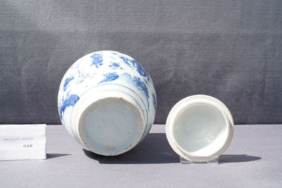 A Chinese blue and white jar and cover with figures in a landscape, Transitional period