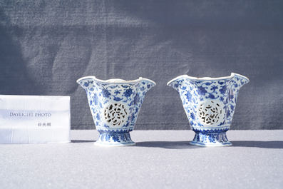 A pair of rare Chinese blue and white double-walled reticulated trilobed libation cups, Qianlong