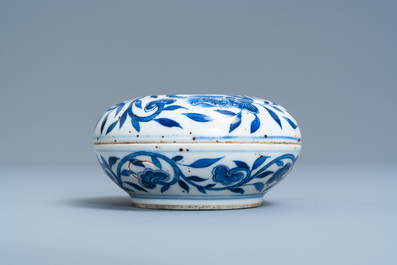 A pair of Chinese blue and white three-tier stacking boxes, a seal paste box and four saucers, 19th C.