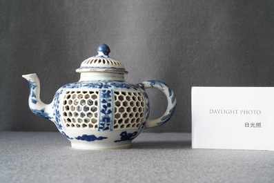 A Chinese blue and white reticulated double-walled teapot and cover, Transitional period