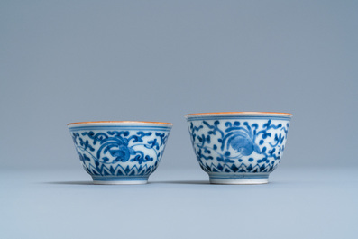 A pair of Japanese blue and white Arita bowls and a pair of celadon 'deer' dishes, Edo, 18/19th C.