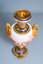 A pair of massive French S&egrave;vres-style vases with gilded bronze mounts, signed Desprez, 19th C.