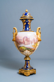 Une paire de tr&egrave;s grands vases en porcelaine dans le style de S&egrave;vres aux montures en bronze dor&eacute;, sign&eacute;s Desprez, France, 19&egrave;me