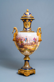 A pair of massive French S&egrave;vres-style vases with gilded bronze mounts, signed Desprez, 19th C.