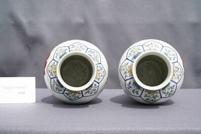 A pair of Chinese famille rose 'mandarin ducks' vases and covers, Kangxi mark, Republic