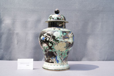 A Chinese famille noire vase and cover, 19th C.