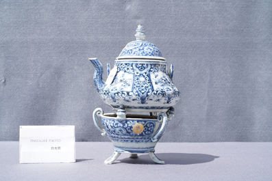 An extremely rare Arita blue and white Delft-style kettle on heating stand, Japan, Edo, ca. 1750