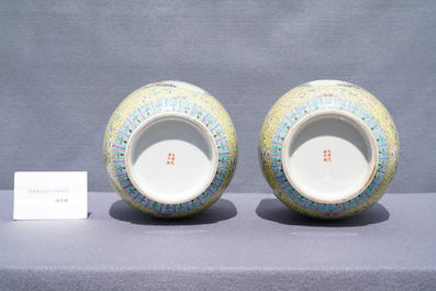 A pair of Chinese famille rose yellow-ground vases and covers, Guangxu mark, Republic