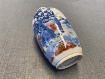 A small Chinese blue, white and copper-red vase, 19th C.