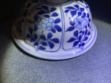 A Chinese blue and white 'horseriders' vase and cover, Kangxi