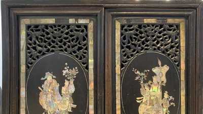 A Chinese or Vietnamese mother-of-pearl-inlaid wooden two-door cabinet, 19th C.