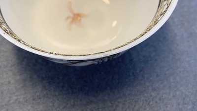 A fine Chinese 'landscape' teapot and a pair of cups and saucers, Yongzheng