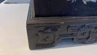 A Chinese or Vietnamese mother-of-pearl-inlaid wooden two-door cabinet, 19th C.