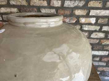 A large Chinese monochrome cream-glazed bulbous vase, 18/19th C.