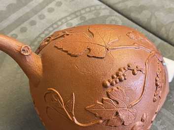 A Chinese Yixing stoneware teapot with squirrels among grapevines, Kangxi