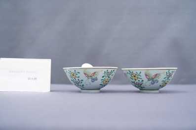 A pair of Chinese famille rose rice grain pattern 'butterfly' bowls, Qianlong mark, 19th C.