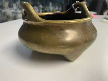 A Chinese bronze tripod censer, Yu Tang Qing Wan mark, Kangxi
