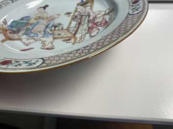 A pair of fine Chinese famille rose ruby back plates with figures in an interior, Yongzheng