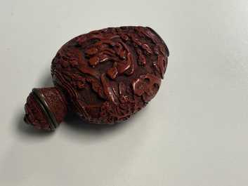 A Chinese carved red cinnabar lacquer 'boys at play' snuff bottle, imperial workshops, Qianlong/Jiaqing