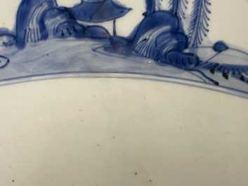 A large Chinese blue and white 'river landscape' bowl, Ming