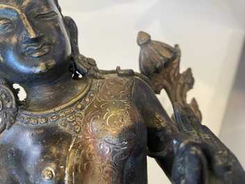 A Sino-Tibetan gilt copper alloy figure of Tara, 19th C.