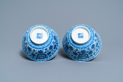 A pair of Chinese blue and white 'wan shou wu jiang' bowls, Qianlong mark and of the period