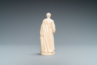Une statue d'un Saint Ermite en ivoire sculpt&eacute; tenant un b&acirc;ton, socle en &eacute;b&egrave;ne et ivoire, Dieppe, 19&egrave;me