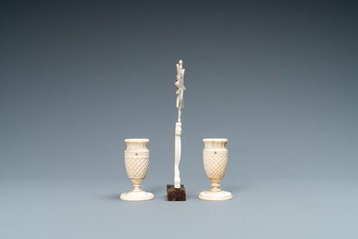 A small ivory crucifix monstrance and a pair of small bone candlesticks, Dieppe, France, 19th C.