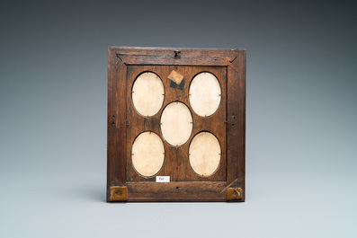 Five ivory portrait medallions set in a pewter-mounted ebony frame, France and/or Italy, 19th C.