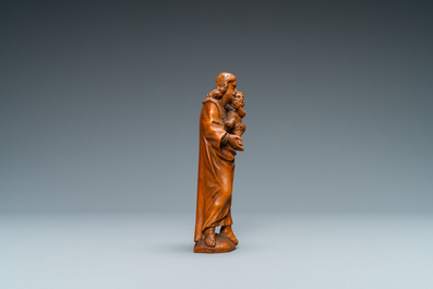 A boxwood figure of Joseph with child, Flanders, 17th C.