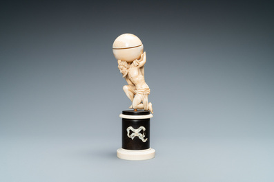 An ivory figure of Atlas carrying the globe, probably Dieppe, 19th C.