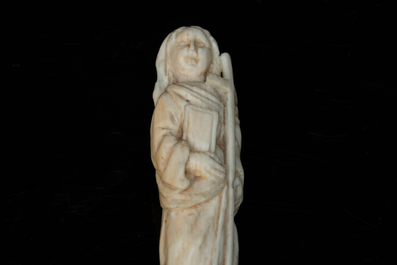 An ivory-handled knife depicting the theological virtue of faith and an ivory folding tailor's ruler, 17/18th and 19th C.